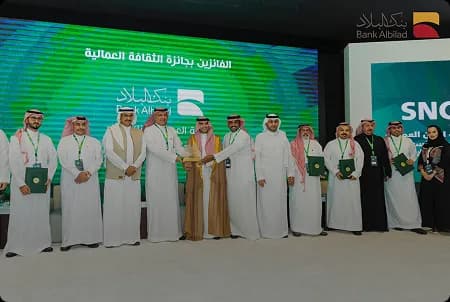Recognition ceremony on stage at a corporate awards night